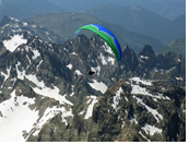Annecy & Chamonix, France - Paragliding tour to the French Alps :: David at 3500m flying over Aiguille de la Tete Plate in Chamonix Mont Blanc area near Swiss border during XC Camp 2022 by Antofaya Expeditions and Jarek Wieczorek