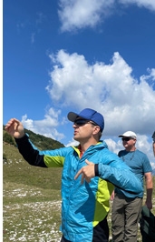 Annecy & Chamonix, France - Paragliding tour to the French Alps :: Jarek doing a preflight briefing at the Monte Valinis, Meduno, Italy takeoff during one of his Slovenia paragliding tours.