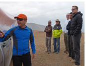 Annecy & Chamonix, France - Paragliding tour to the French Alps :: Jarek doing a preflight xc briefing at the San Marcos, Chile takeoff during one of his classic Iquique, Chile paragliding tours.