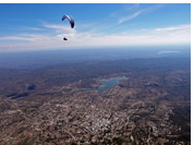 Above Capilla del Monte town :: Paragliding above Capilla del Monte during spring high cloudbase conditions, Sierras de Cordoba, Argentina