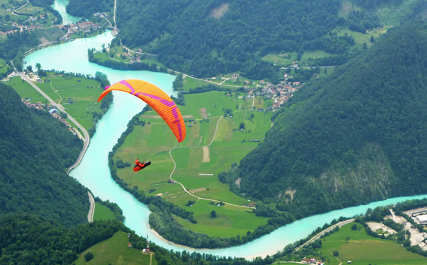 Paragliding toward Gemona along Stol range, Julian Alps, Slovenia