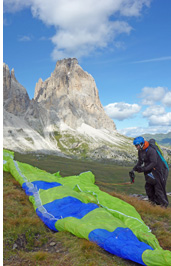 Paragliding the Dolomites. Sassolungo seen from the Col Rodella take off.