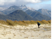 Playa San Quintin - 30km long virgin beach of Playa San Quintin with Andean peeks in the background, Golfo de Penas, Aisen, Patagonia, Chile