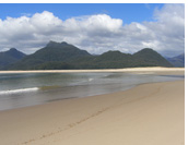 Punta Blanca - Sandy peninsula which closes entry to Bahia Kelly fjord, Golfo de Penas, Aisen, Patagonia, Chile