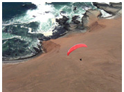 Paragliding at Caleta Colorada, Iquique, Atacama Desert, Chile 