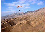 Cerro Toro - Paragliding over plateou of Cerro Torro masive, Pisagua, Atacama Desert, Chile - Pilot: Ken Hudonjorgensen, USA - Fly Atacama 2008 organizer