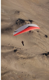 Paragliding near Tiliviche canyon, Pisagua, Atacama Desert, Chile