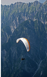 Musi Range::Wild Monte Musi range across the valley in Italy as seen on an XC flight from Slovenia, Parco Regionale delle Prealpi Giulie, Italy - Slovenia 2012 - The Joy of XC - Paragliding Adventure Tour in The European Alps